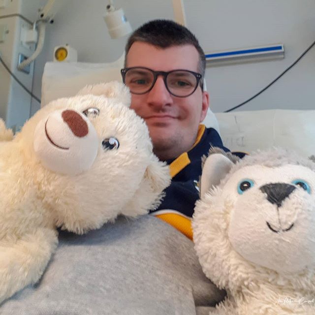 John on HD with two cuddly toys. 